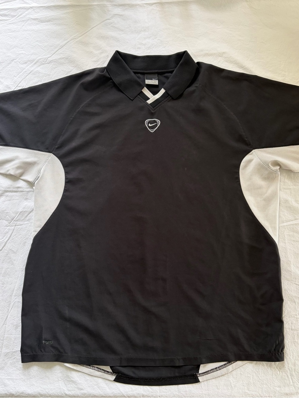 Vintage Nike Black Polo with White Side Panels and V‑Neck Trim